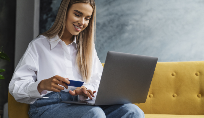 Woman on her laptop online shopping