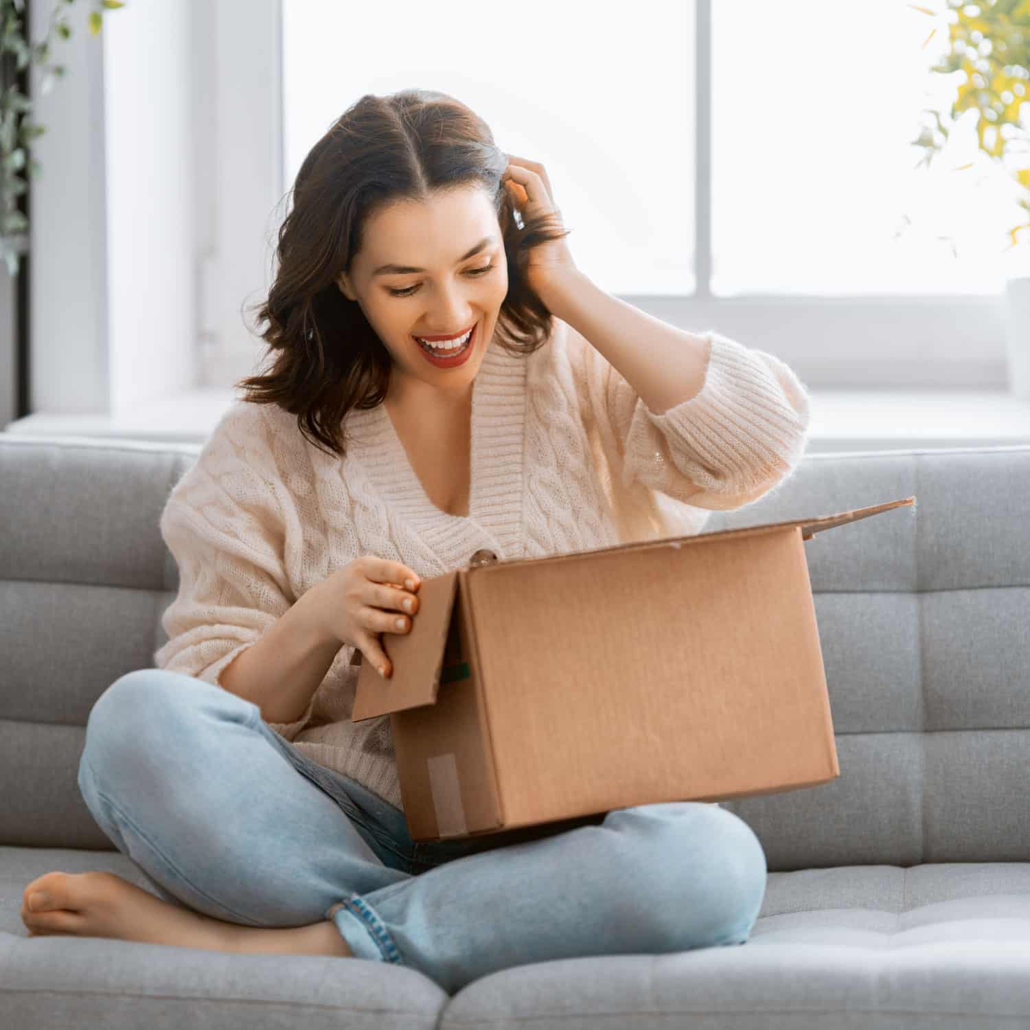 Lady delighted with parcel